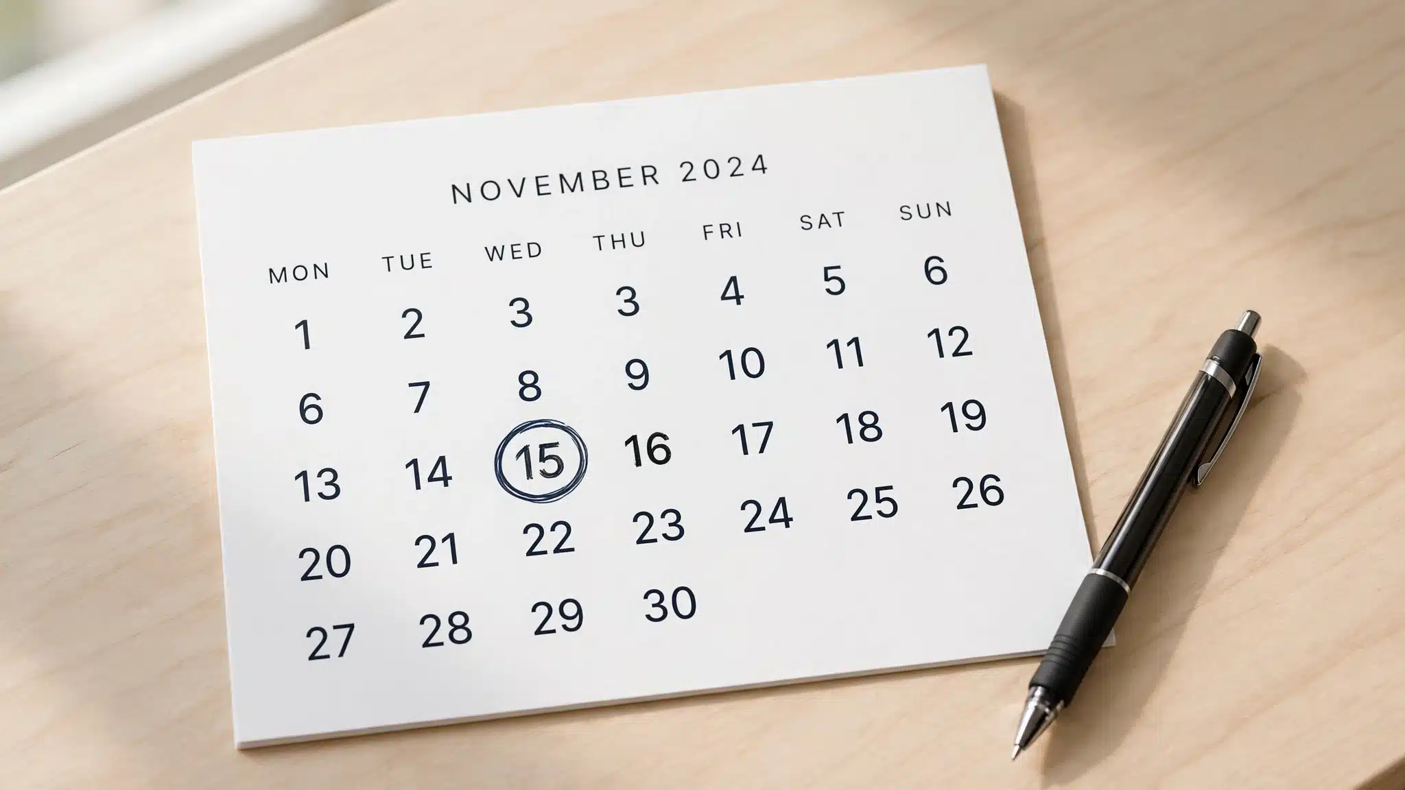 Plain desk calendar marking appointment dates